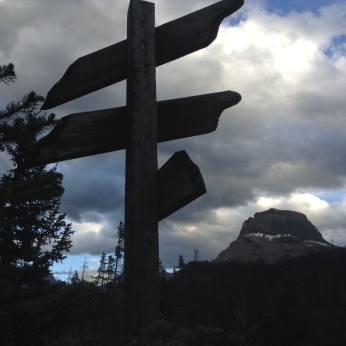 A signpost that points out other significant peaks in Yoho National Park with Cathedral Mountain looming in the background. Photography by Freshscribe